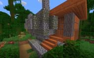 A jungle temple with a village building on its side (Image via Minecraft)